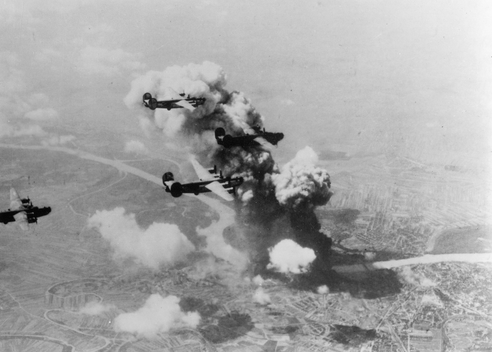 15th Air Force B-24s attacking the Apollo oil refinery in Bratislava, Slovakia 